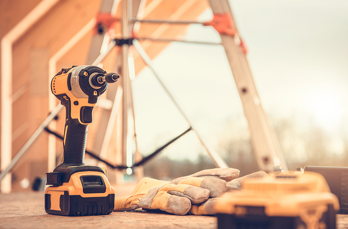 Construction Site Power Tools and Safety Gloves